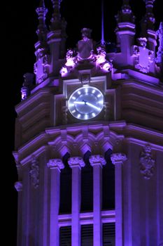 Beautiful City Hall of Madrid illuminated in purple in the International Women's Day