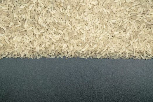 rice grains on a black background close-up. High quality photo