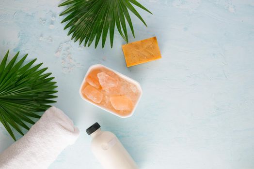 Beauty oncept with spa set on blue wooden background