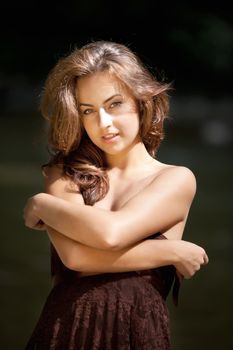 Young woman portrait near the river