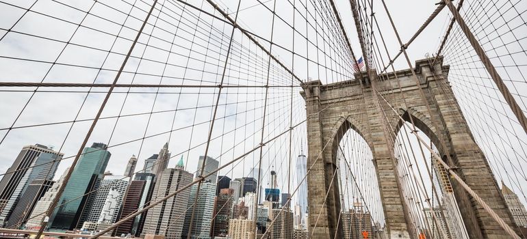 Brooklyn Bridge in New York. Manhattan skyline in background