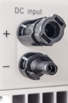 Male and Female MC4 connectors on bottom side of power inverter for connect to solar panel