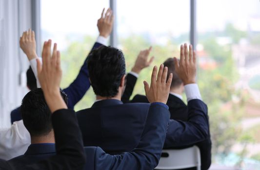 Shot of a group of businesspeople having a discussion in an office 