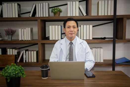 Professional medical doctors working in hospital office using computer technology. Medicine and healthcare.