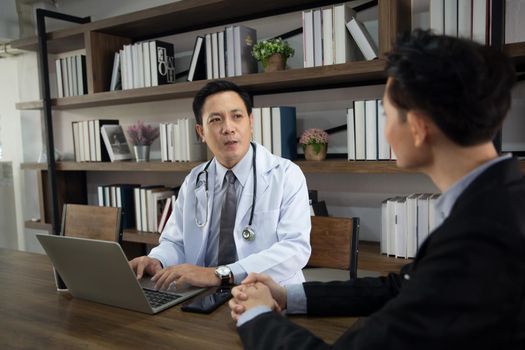 Professional medical doctors working in hospital office using computer technology. Medicine and healthcare.