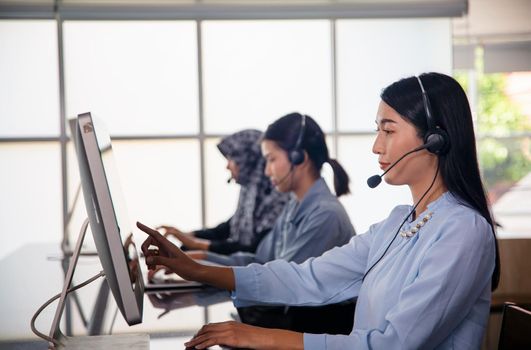 Colleagues working in a call center.