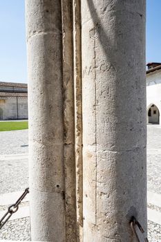 Spilimbergo, Italy. June 3 2021.  La Macia, an ancient medieval measuring system carved on a column of the La Loggia palace in the town center