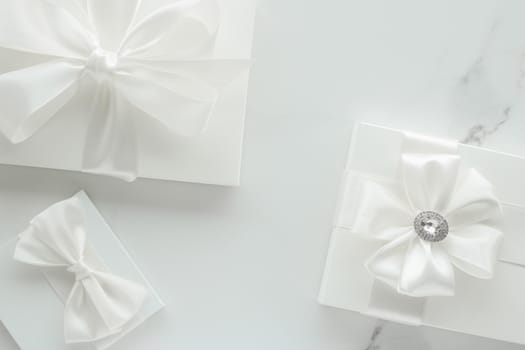 Romantic celebration, lifestyle and holiday present concept - Luxury wedding gifts on marble