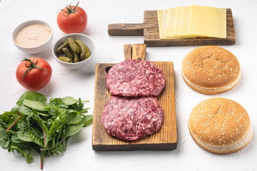 Burger banner. Raw ingredients for burger set, on white stone background