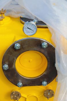 Close-up of a monometer on an air compressor.