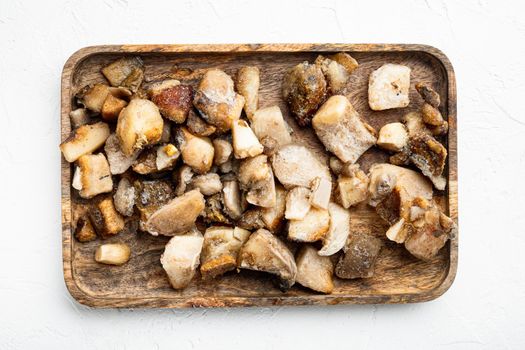Frozen wild mushrooms set, on white stone background, top view flat lay