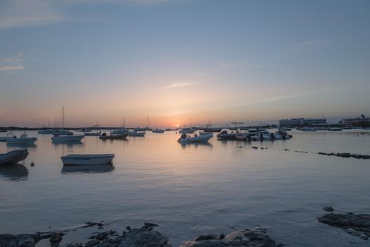 Sunset in the Estany d Es Peix in Formentera, Spain.