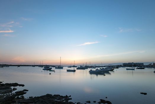 Sunset in the Estany d Es Peix in Formentera, Spain.