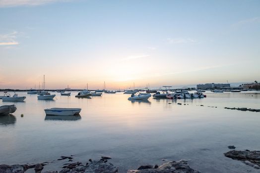 Sunset in the Estany d Es Peix in Formentera, Spain.