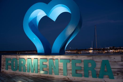 Formentera, Spain: 2021 May 26: Photocall with a night view of the port of La Savina in Formentera summer 2021.