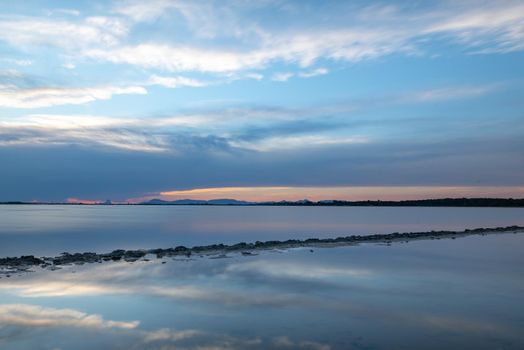 Sunset at the Estany Pudent in the Ses Salines Natural Park in Formentera, Spain.