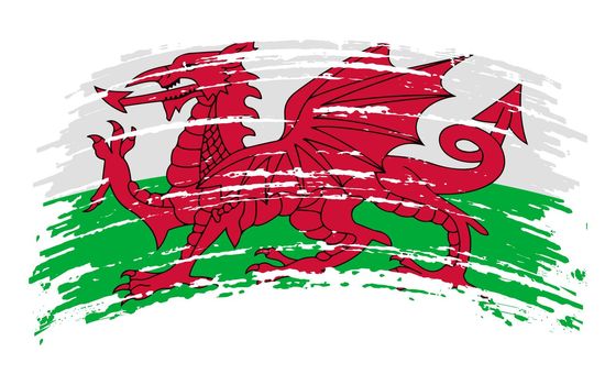 Wales flag in grunge brush stroke, vector image