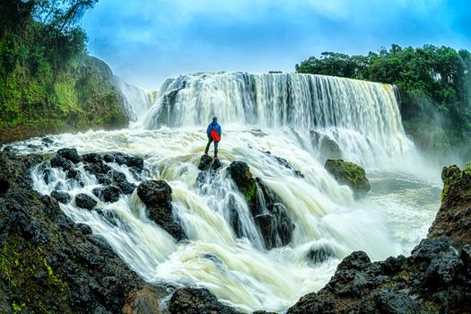 Waterfall landscape in the rainy season, The powerful of Sae Pong Lai waterfall in Southern Laos.