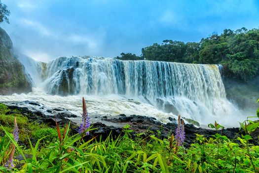 Waterfall landscape in the rainy season, The powerful of Sae Pong Lai waterfall in Southern Laos.