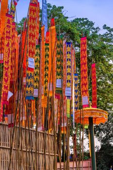 Paper flag on the pile of sand or Sand pagoda in Songkran festival at Jedlin Temple located in Muang, Chiang Mai, Thailand.  A Believe of people in the deceased relative to Paradise.