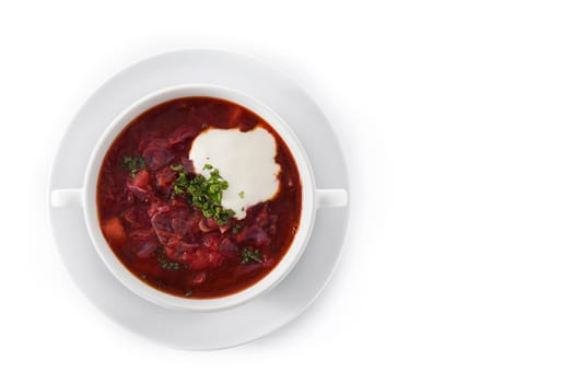 Traditional Ukrainian Russian borsch. Beetroot soup isolated on white background