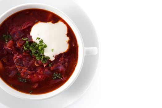 Traditional Ukrainian Russian borsch. Beetroot soup isolated on white background