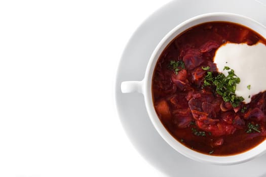 Traditional Ukrainian Russian borsch. Beetroot soup isolated on white background