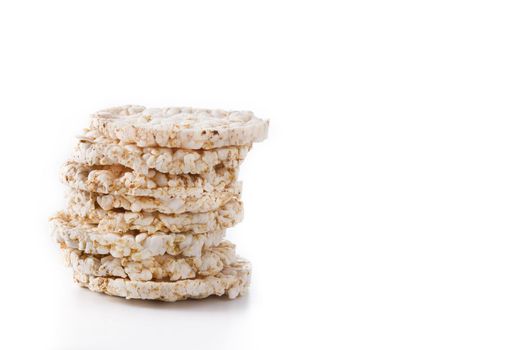 Pile of puffed rice cakes isolated on white background