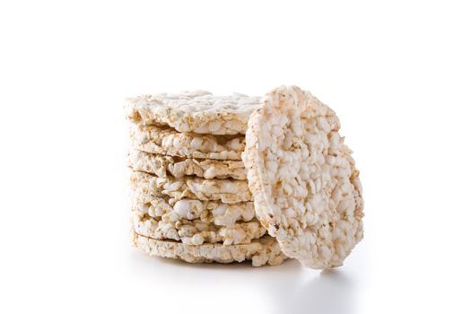 Pile of puffed rice cakes isolated on white background