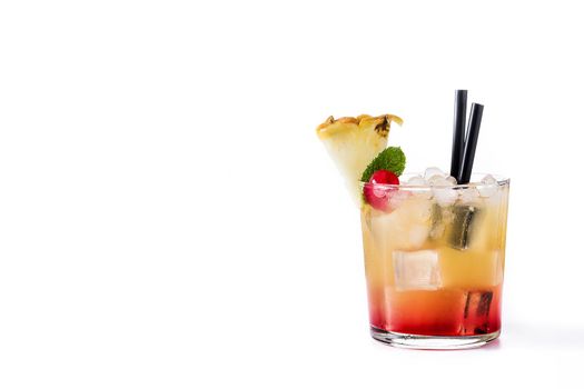 Cold mai tai cocktail with pineapple and cherry isolated on white background