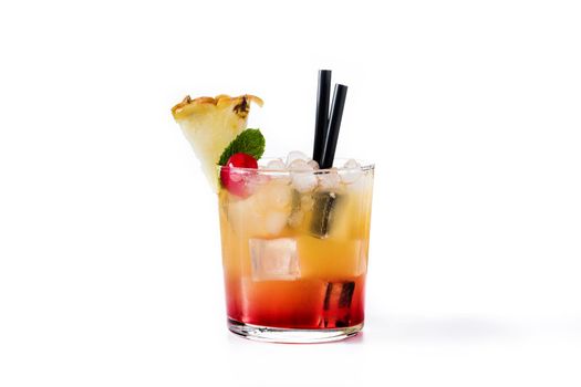 Cold mai tai cocktail with pineapple and cherry isolated on white background