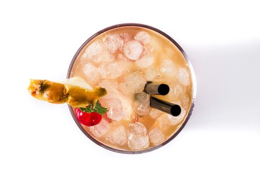 Cold mai tai cocktail with pineapple and cherry isolated on white background.