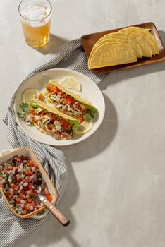 Mexican pork tacos with vegetables. Delicious tacos