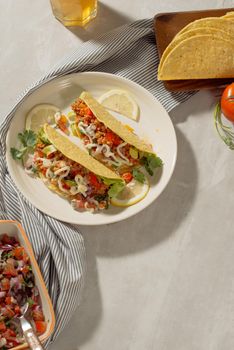 Mexican pork tacos with vegetables. Delicious tacos