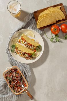 Mexican pork tacos with vegetables. Delicious tacos