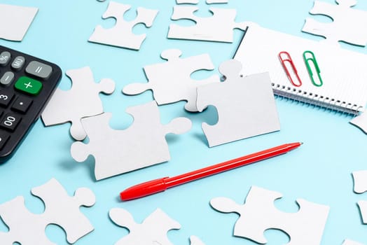Building An Unfinished White Jigsaw Pattern Puzzle With Missing Last Piece