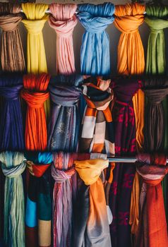 Pile of bright Multi-colored pieces of fabric in a bazaar