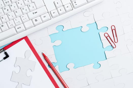 Building An Unfinished White Jigsaw Pattern Puzzle With Missing Last Piece
