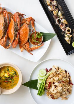 Set of Thai seafood popular menu setting on white table