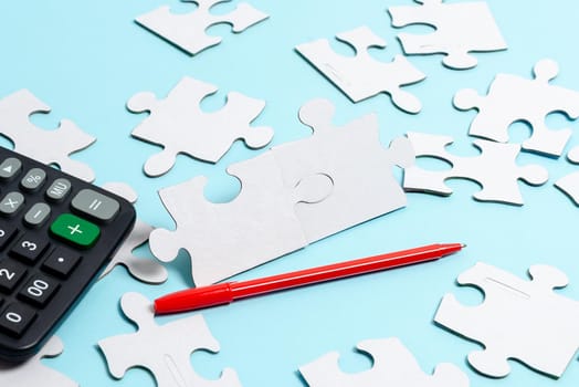 Building An Unfinished White Jigsaw Pattern Puzzle With Missing Last Piece
