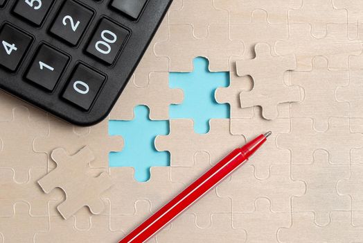 Building An Unfinished White Jigsaw Pattern Puzzle With Missing Last Piece