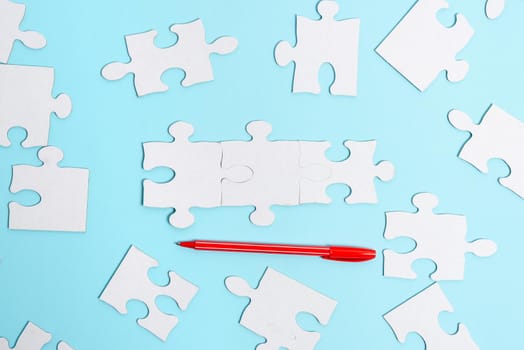 Building An Unfinished White Jigsaw Pattern Puzzle With Missing Last Piece