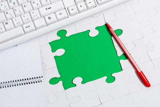 Building An Unfinished White Jigsaw Pattern Puzzle With Missing Last Piece