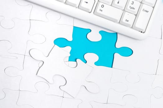 Building An Unfinished White Jigsaw Pattern Puzzle With Missing Last Piece