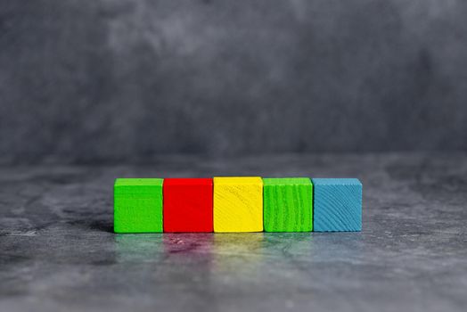 Stack of Sample Cube Rectangular Boxes On Surface Polished With Multi-Colour