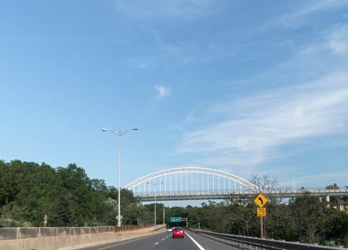 Crossing the road leading to Niagara Falls on the second level passes the Bridge with an arch