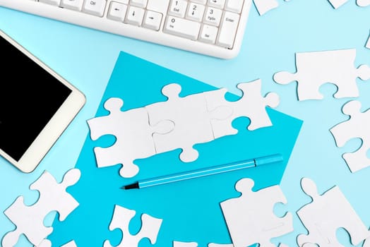Building An Unfinished White Jigsaw Pattern Puzzle With Missing Last Piece
