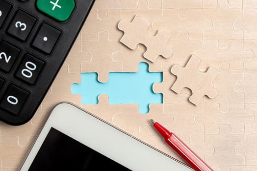 Building An Unfinished White Jigsaw Pattern Puzzle With Missing Last Piece