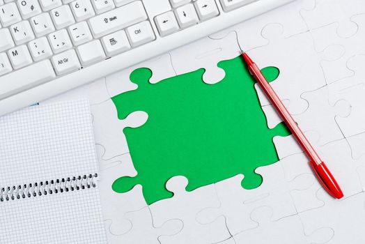 Building An Unfinished White Jigsaw Pattern Puzzle With Missing Last Piece