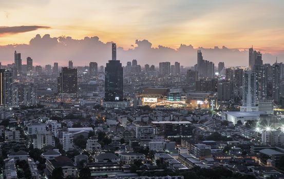 Bangkok, Thailand - Jun 01, 2021: Aerial view of Beautiful scenery view of Skyscraper Evening time Sunset creates relaxing feeling for the rest of the day. Selective focus.